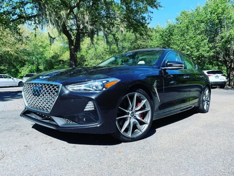 A used Genesis sedan on the Low Country Motors lot in Bluffton