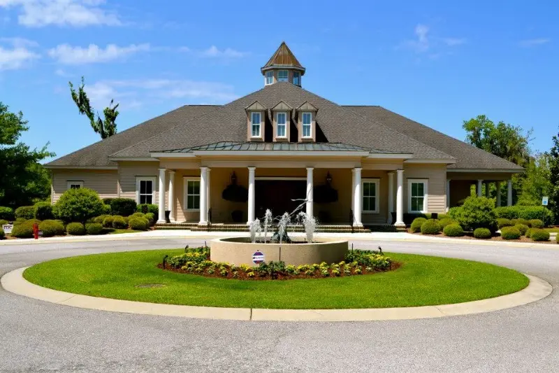 The columned entrance and fountain at Sauls Funeral Home on Simmonsville Road