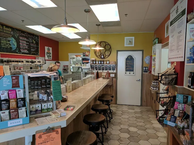 The counter and menu boards inside The Juice Hive juice bar in Bluffton Village