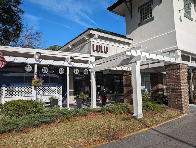 The white pergola and Lulu sign at the front of Lulu Kitchen on William Hilton Parkway