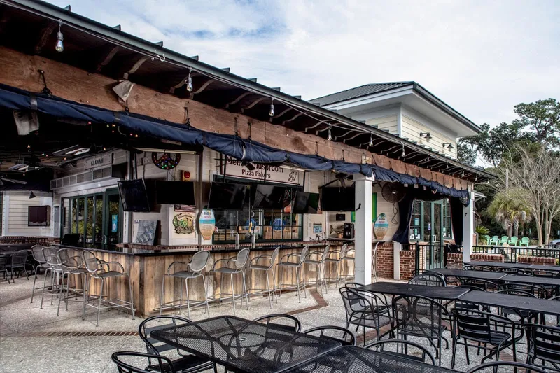 The covered outdoor bar and patio tables at Mellow Mushroom on Office Park Road