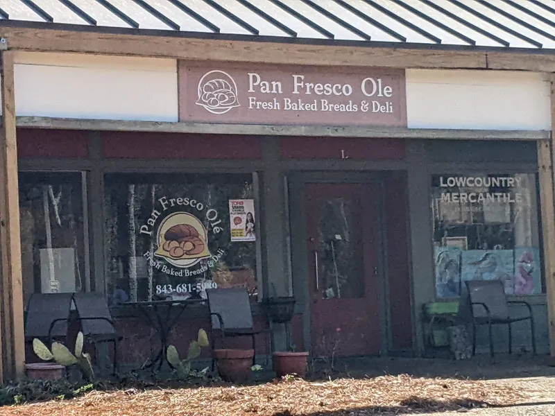 The Pan Fresco Ole storefront on William Hilton Parkway, with its Fresh Baked Breads & Deli sign above the door
