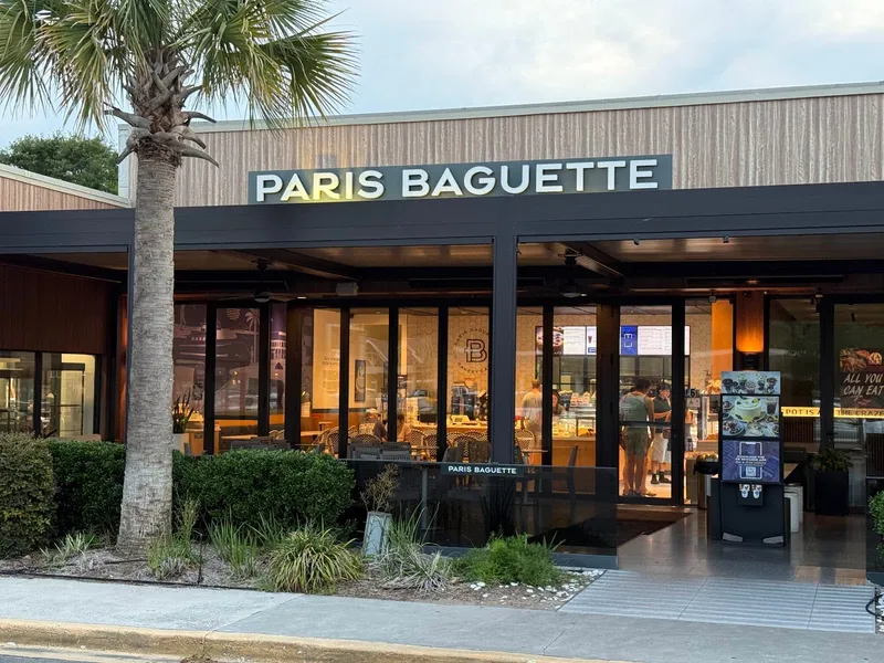 The Paris Baguette storefront at 95 Mathews Drive, with its sign over the glass front