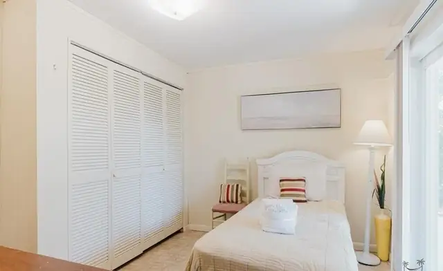 Bedroom of this home in Forest Beach