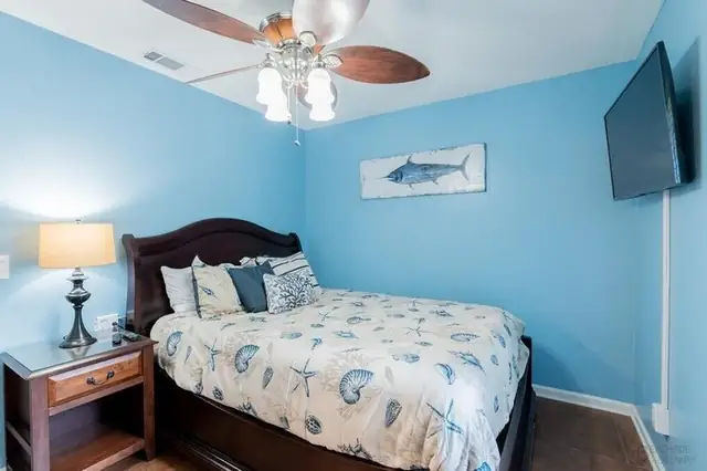 Bedroom of this home in Forest Beach