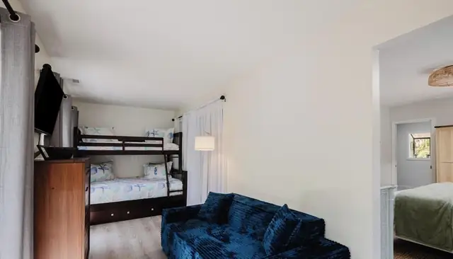 Bedroom of this home in Forest Beach