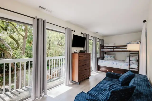 Bedroom of this home in Forest Beach