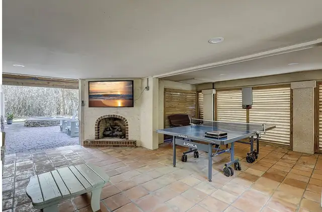 Game room of this home in Forest Beach