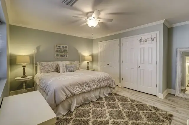 Bedroom of this home in Forest Beach