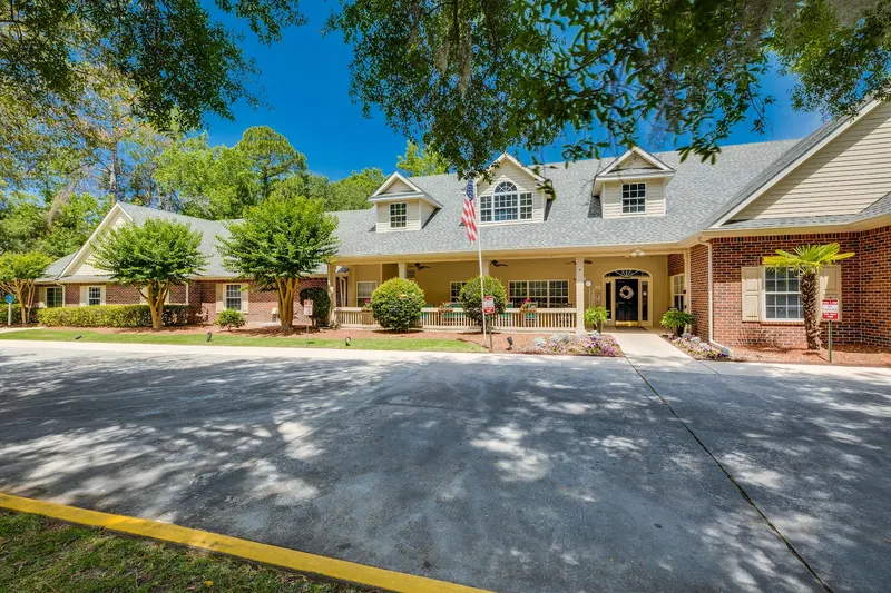 The front porch and flagpole of Village Cove Assisted Living on Main Street