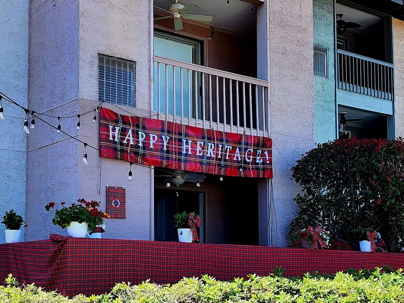 A Lighthouse II villa with balconies and a ground-floor patio decorated for the RBC Heritage, Harbour Town, Sea Pines