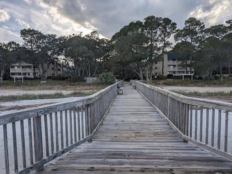 The boardwalk to the beach at Port Royal Sound, with The Spa on Port Royal Sound’s buildings behind