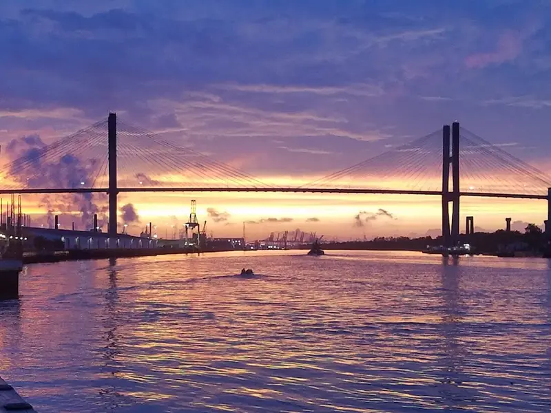 The Talmadge Memorial Bridge over the Savannah River at sunset, seen from River Street