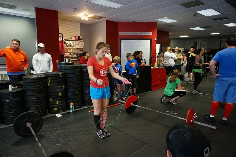 Inside a CrossFit gym on Hilton Head Island, with barbells, rigs and rowing machines