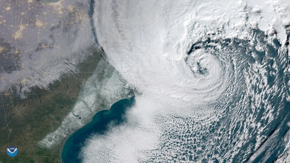 Satellite image from January 2018 showing snow cover across the Carolinas and the Southeast after the nor’easter, with a white band reaching the Georgia and South Carolina coast