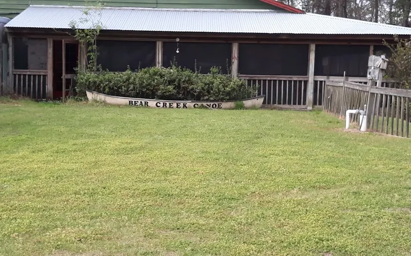 The Blue Heron Nature Center building in Ridgeland, with a planter made from an old canoe out front
