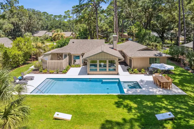Pool and backyard of this home in Sea Pines