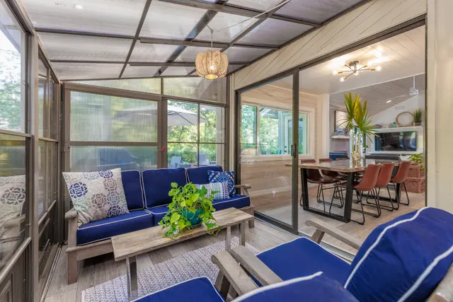 Screened porch of this home in Sea Pines