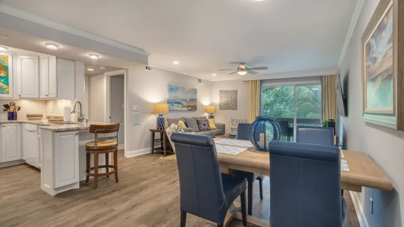 Open kitchen, dining and living area in a Bluff Villas unit
