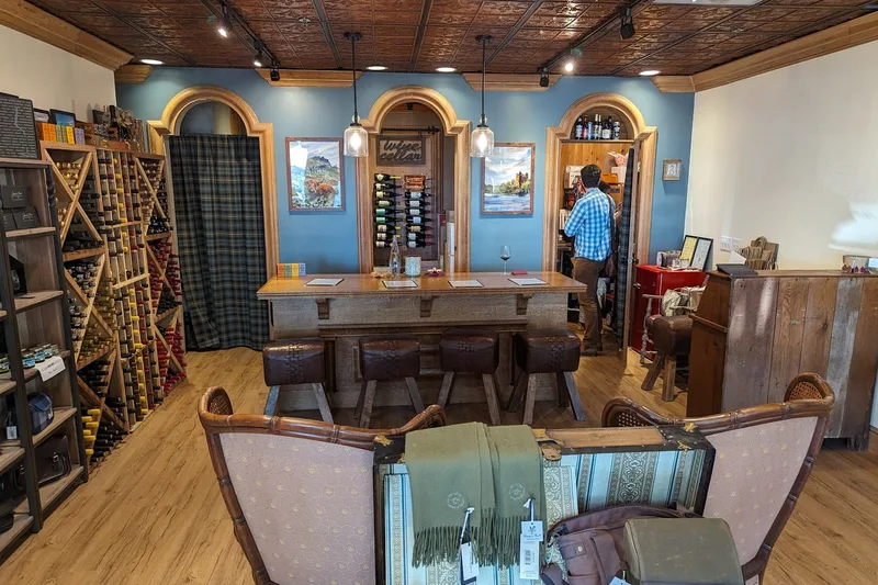 The tasting table, wine racks and cellar door inside Honey & Thistle in Harbour Town