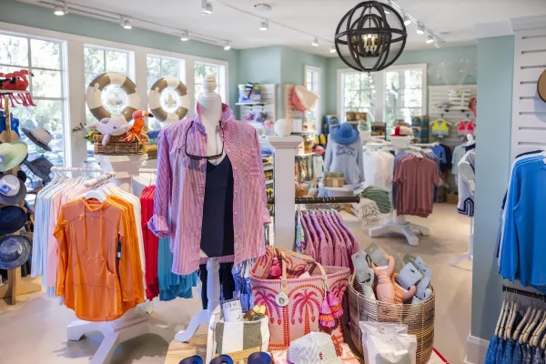 Inside The Surf Shop at Sea Pines Beach Club with shirts, hats and beachwear