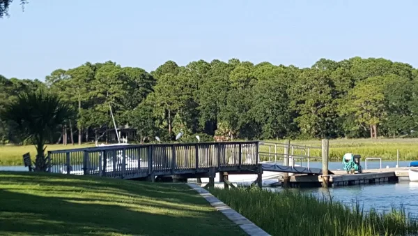 The dock and marsh at South Beach, where Tailer May'd Charters departs