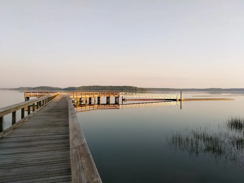 The long wooden pier and floating dock reaching into Skull Creek at dawn, Squire Pope Community Park