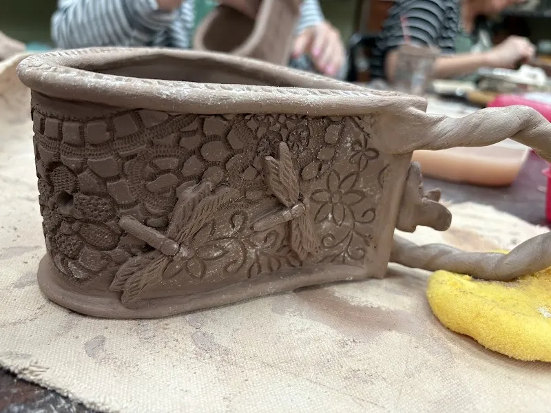 A hand-built clay piece with pressed texture, made during a class at Hilton Head Pottery